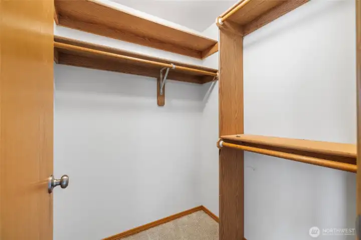 Primary walk-in closet Primary walk-in closet