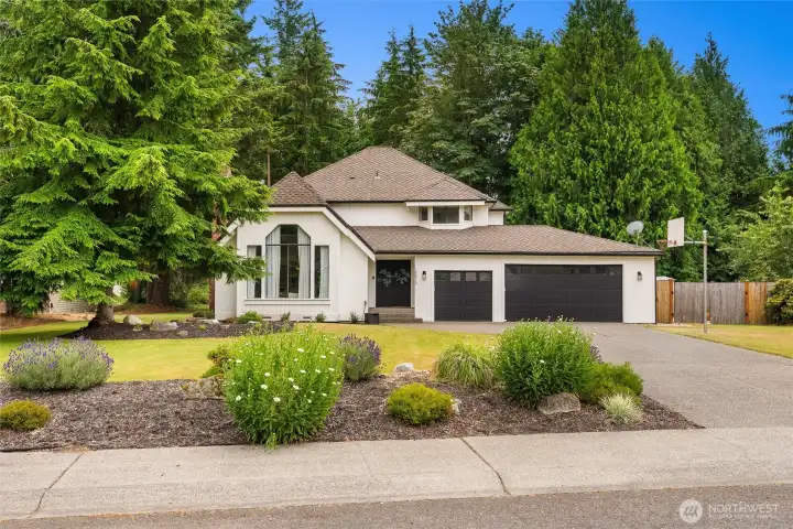 Welcome to 15813 SE 160th Place, within The Ridge at Fairwood, your quintessential modern residence sited on nearly half an acre.
