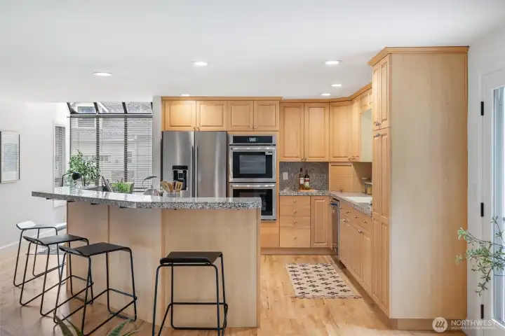 The center island with breakfast bar offers plenty of space for entertaining.
