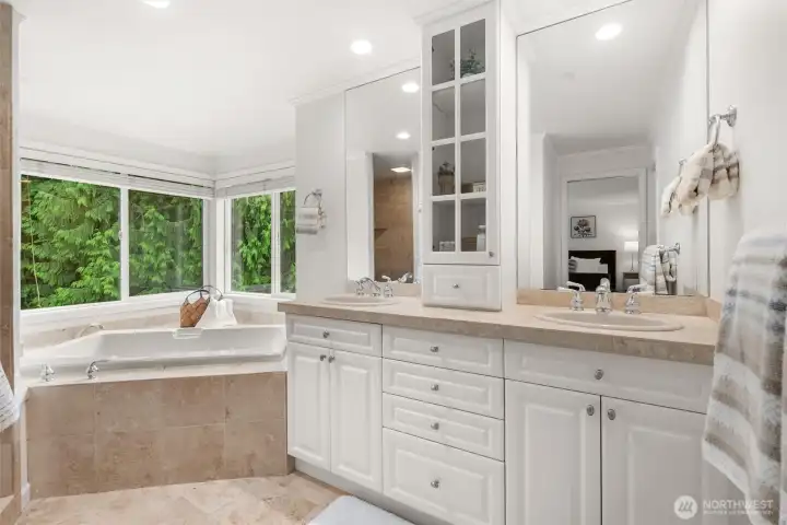 Enjoy a deep soaking tub overlooking the rear grounds.