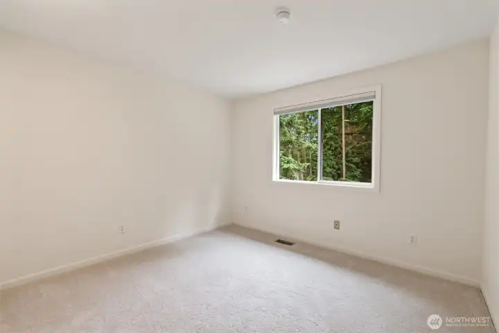 Two additional bedrooms complete the second floor of this stunning residence.