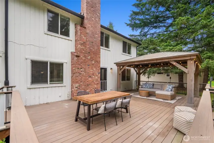 Enjoy plenty of entertaining space with an extended Timbertech deck with gazebo.
