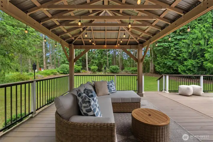 This peaceful gazebo overlooks the private and serene backyard.