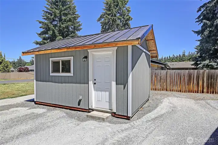 Detached shop provides excellent storage and workspace flexibility.