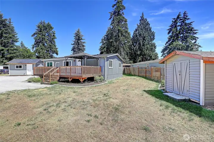 Everything you need; shop, storage, parking, and outdoor living—all in one property.