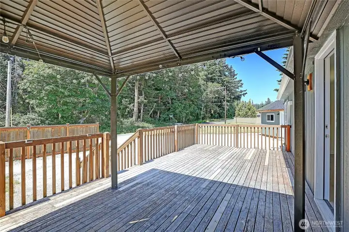 Enjoy outdoor living rain or shine on the covered deck.