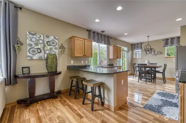 Teak floors in the kitchen and family room are beautiful and durable.