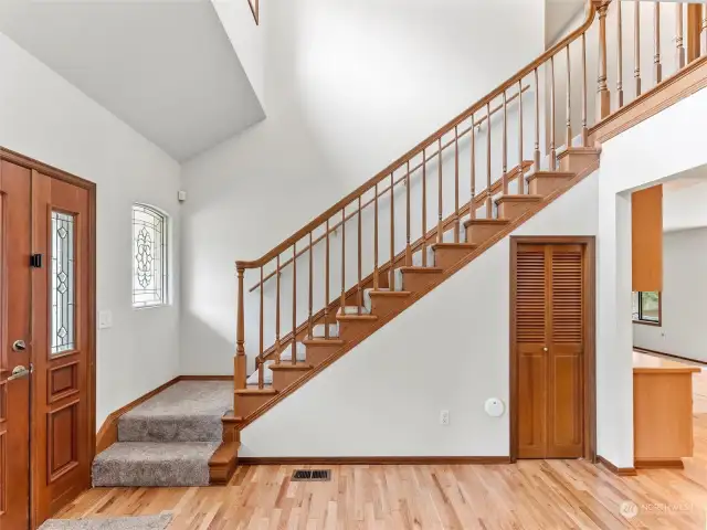 Hardwood floor entry all the way into the kitchen