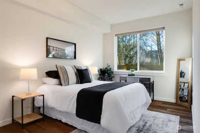 Generous downstairs bedroom--view to back Native Growth Protection.