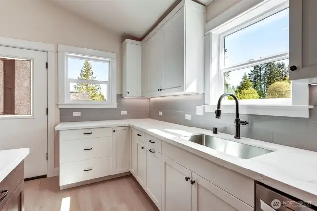 Bright kitchen with stainless steel appliances