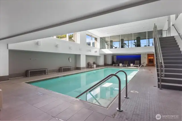 Dive into the transformative experience of your in-building pool, where achieving a sleek swimmer's physique becomes a luxurious reality. This elegant aquatic haven offers the perfect setting for your daily laps, helping you sculpt and tone your body with ease and convenience. Imagine the freedom of swimming at any time, right from the comfort of your luxury home, making fitness an effortless and enjoyable part of your lifestyle.