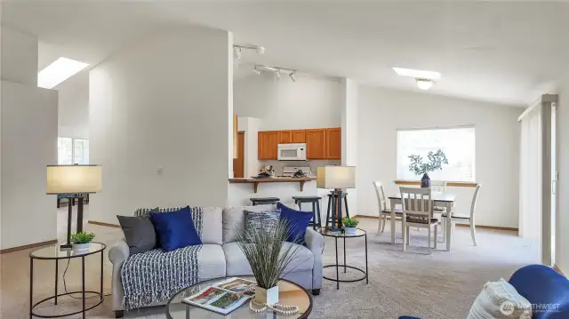 Open Concept With Vaulted Ceilings. You And Your Plants Get to Bathe In Natural Light w/ 2 Skylights!!