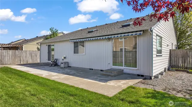 Left Patio Door Goes To Primary Bedroom And The Right Patio Door Goes To The Dining Room. 6ft Fully Fenced Back Yard With Shed!! Awning Extends To The Edge Of Patio. This Home Is A Must See