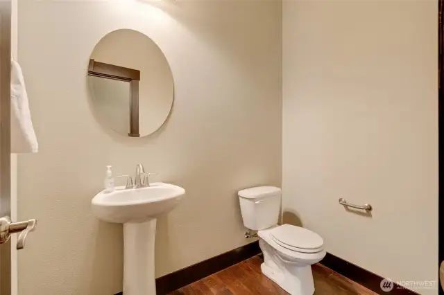 A freshly painted half bathroom.