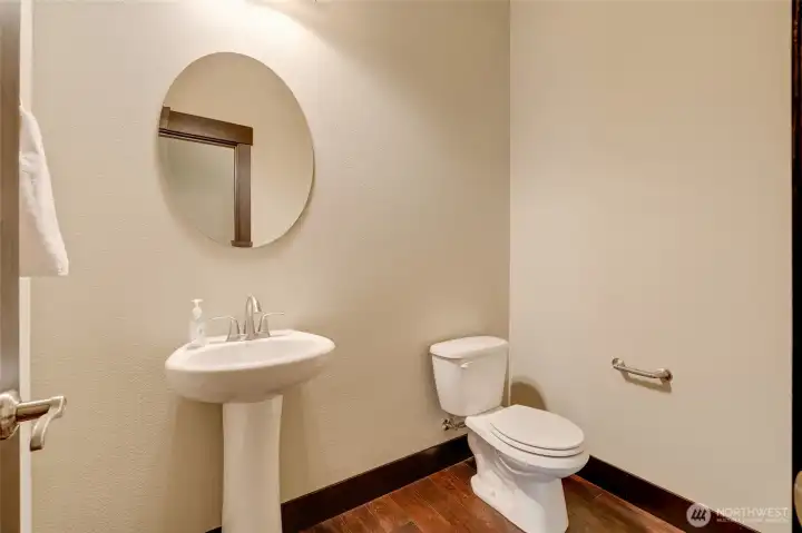 A freshly painted half bathroom.