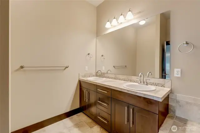 Double sink vanity in the primary bathroom.