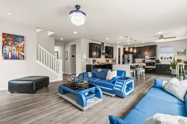 Living room view with kitchen