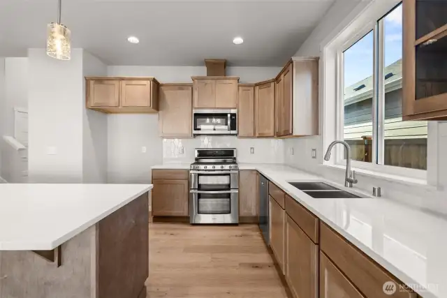 Home is under construction. Photos, including virtually staged, are of a previously bult home in a different community with similar finishes. Builder reserves the right to make changes to plans & specifications without notice. Features vary by plan. Buyer to verify square footage.