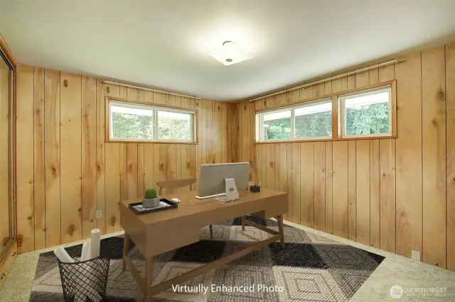 A second bedroom on the main floor could also serve as a home office.
