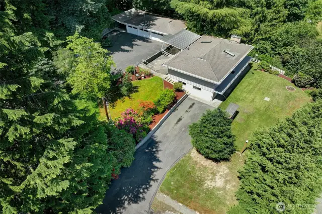 In this aerial shot you can see a 2nd driveway - suitable for ADU parking.