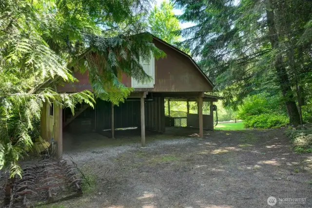 An additional building has been used for storage and parking - this area may be suitable for an DADU dwelling.  (Buyer to investigate)