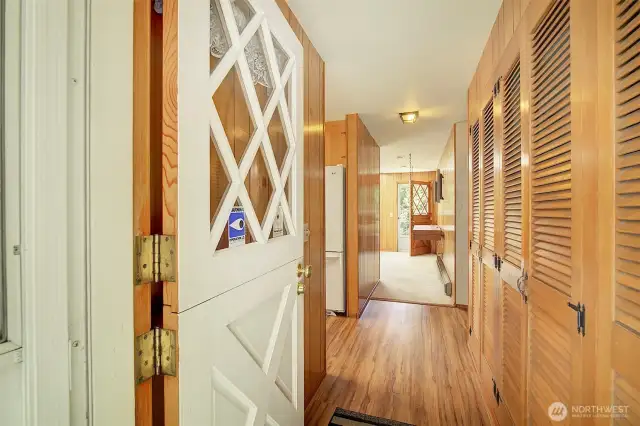 A charming Dutch door welcomes in homeowners and guests alike.