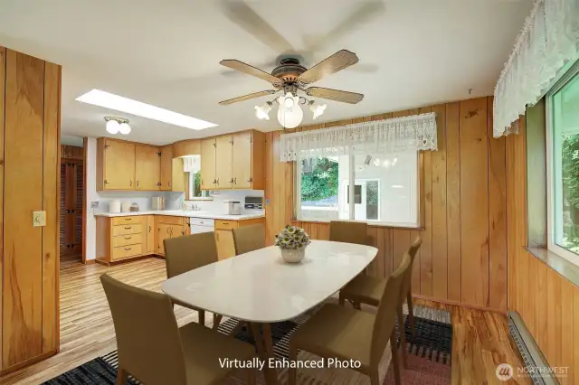 The dining area is adjacent to the kitchen and offers plenty of room for a large table.