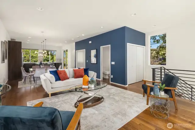 Great room flowing into dining and kitchen.