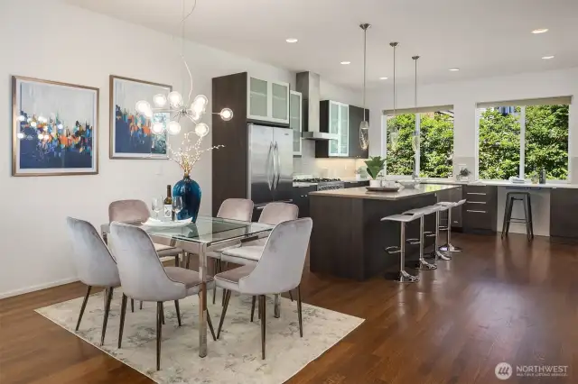 Dining room featuring open layout to large kitchen.