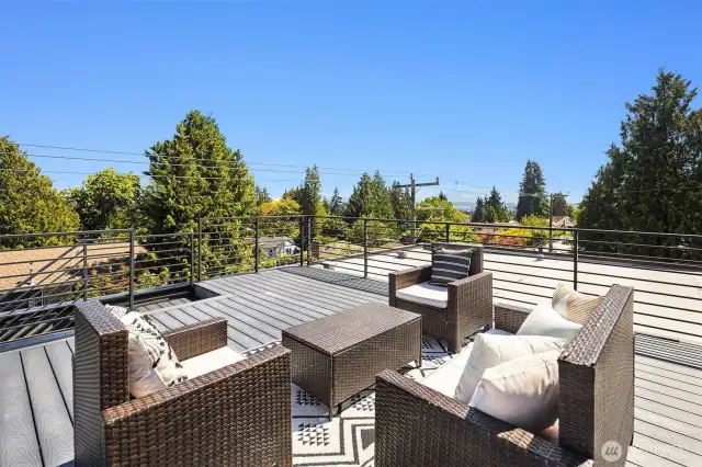 Rooftop deck featuring view of Mount Rainier.