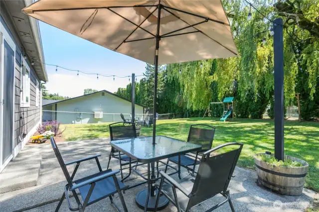 Patio in fully fenced back yard!