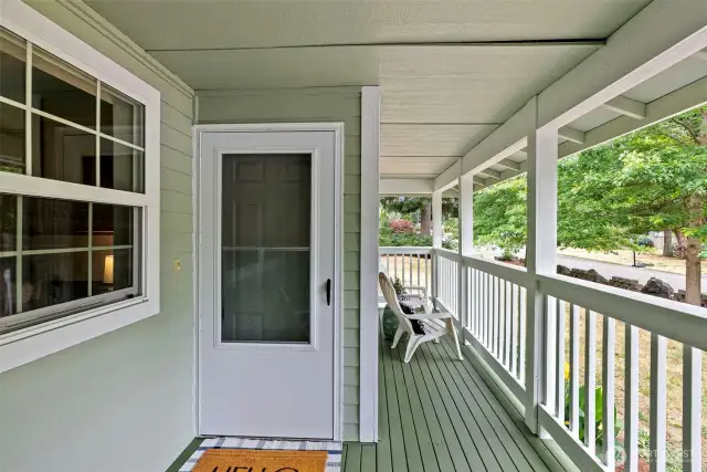 Cute covered front porch is perfect for relaxing.