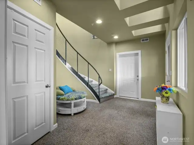 Lower level mud room/entry. This leads to the lower patio with hot tub overlooking the lake.