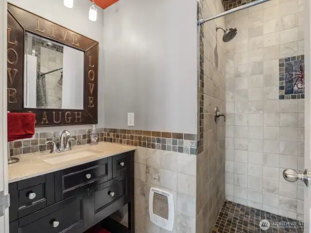 Lower level bathroom offers ease of use when getting out of the lake or hot tub.
