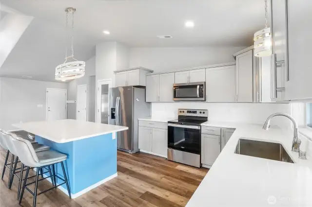 Lots of cabinetry and a pantry for storage.
