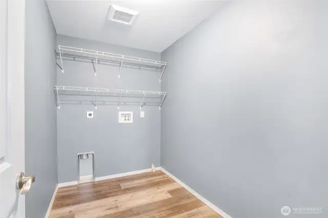 Separate laundry room.