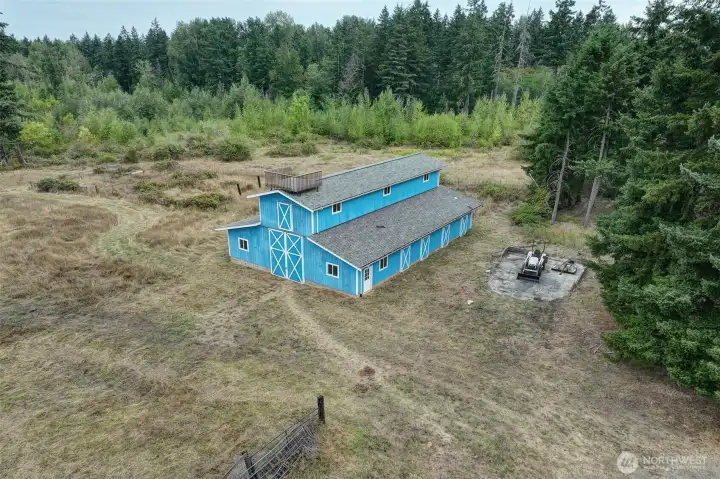 Deck on the roof top of the barn has some amazing views. The pad where the tractor is parked is large enough for an RV