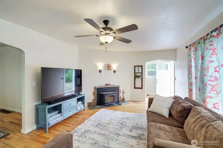 Cozy living room with wood stove.