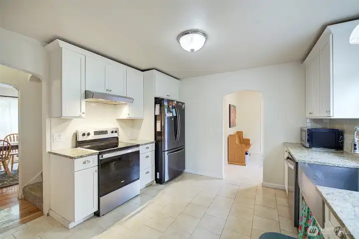 Kitchen is just off the dining room and a mud room with separate entrance.