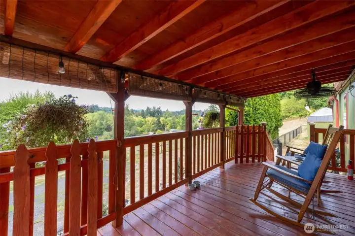 Covered front porch area overlooking the pasture.