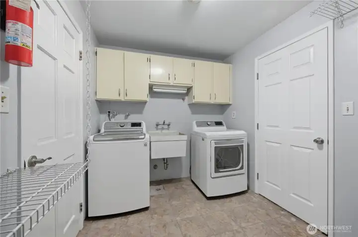 Laundry is on lower level nicely located between bedrooms and garage