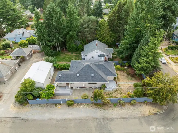 North Tacoma near UPS, Proctor, and easy highway access. Massive detached 3 Bay Garage/shop unique to North Tacoma all on a wide corner lot.