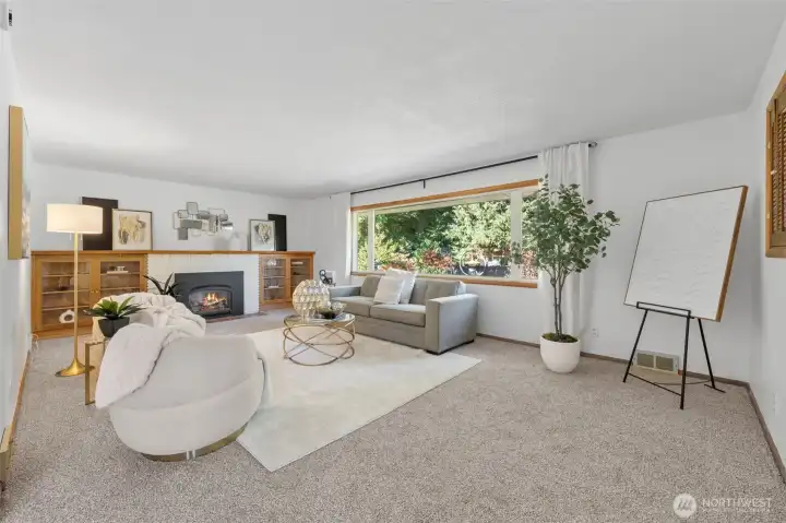 Cozy living room with original built-ins and a cozy gas fireplace.