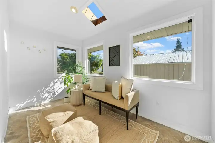 Private patio off of sunroom.