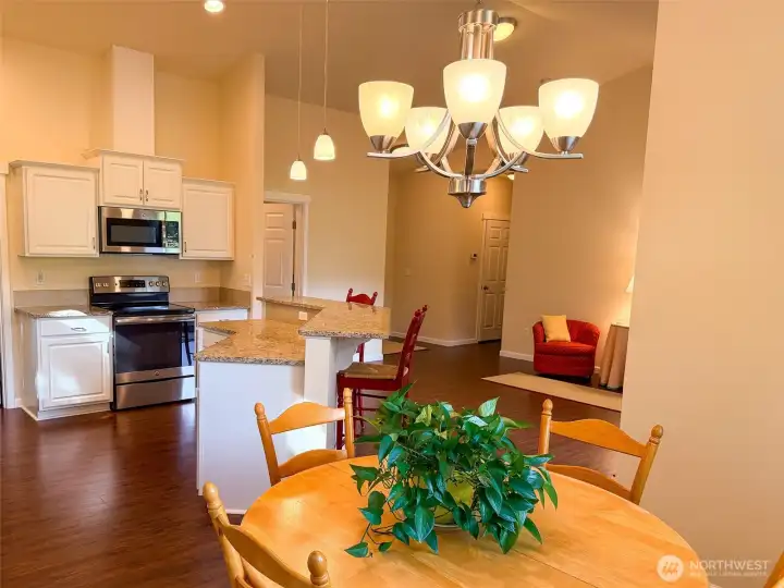 Looking toward front entry and hallway to the bedrooms & bathrooms. Door on the right is main full bath.