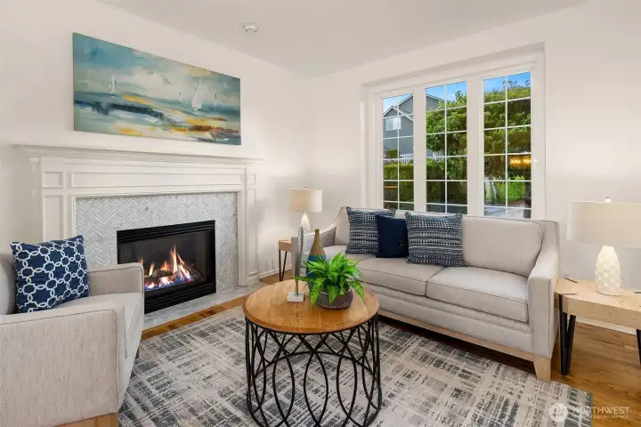 Formal living room with fireplace. Grand entry welcomes you home. Burnstead quality and craftsmanship is evident.