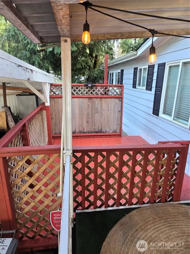 Additional patio space off covered front patio