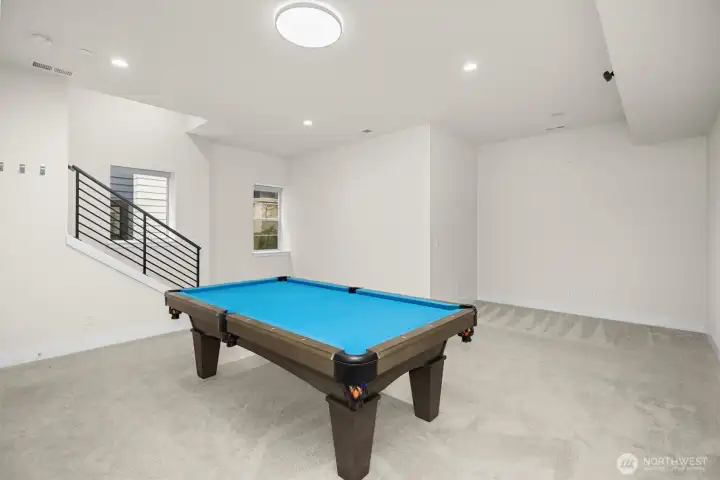 Located on the lower level with extra high ceilings!