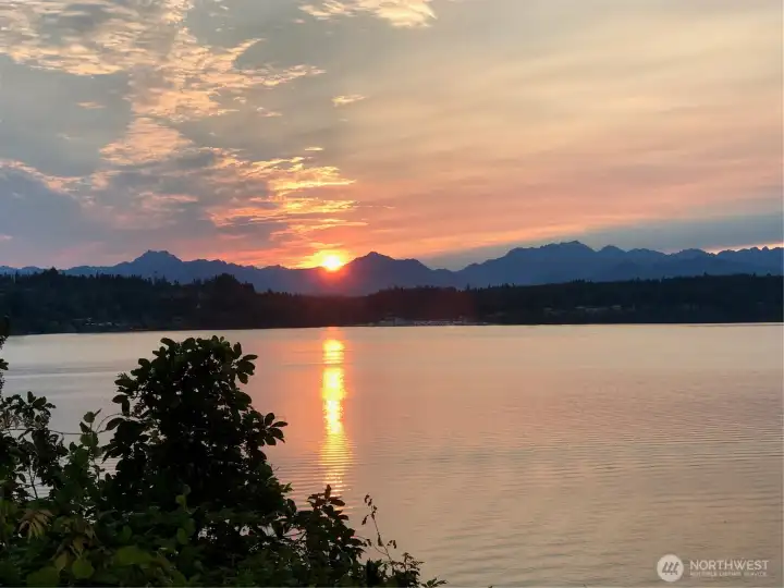 Golden sunsets stretch across the water toward the majestic Olympic Mountains — their peaks often dusted in snow, creating a breathtaking Northwest backdrop. At 9549 Olympus Beach, every evening feels like a front-row seat to nature’s most spectacular show.