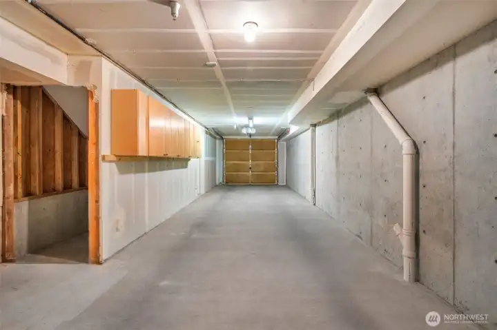 Tandem 2 car garage with extra storage.